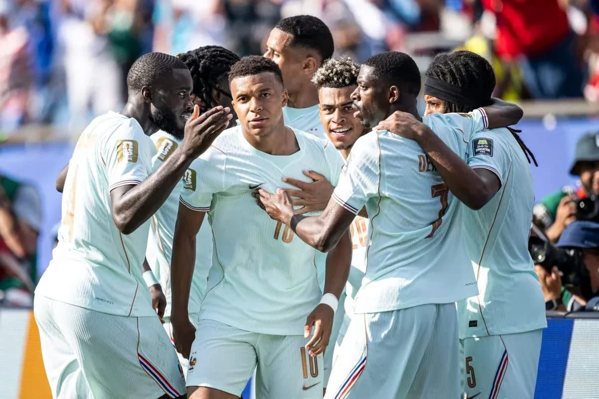 Players celebrating a goal during a match Players celebrating a goal during a match