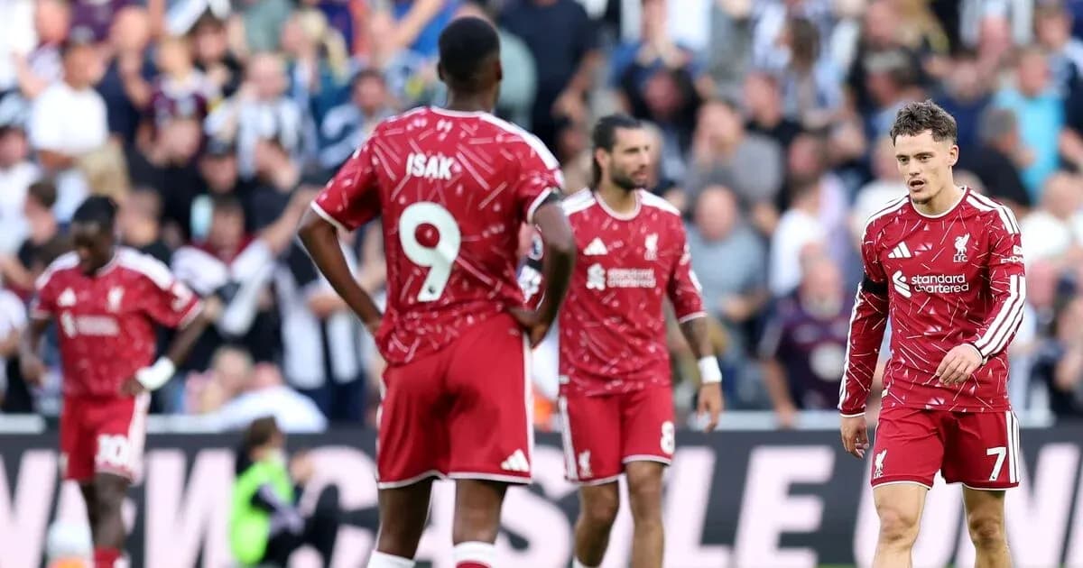 Liverpool players walking off the pitch after match Liverpool players walking off the pitch after match