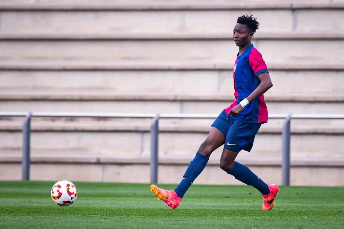 Player in Barcelona kit controlling the ball on field Player in Barcelona kit controlling the ball on field