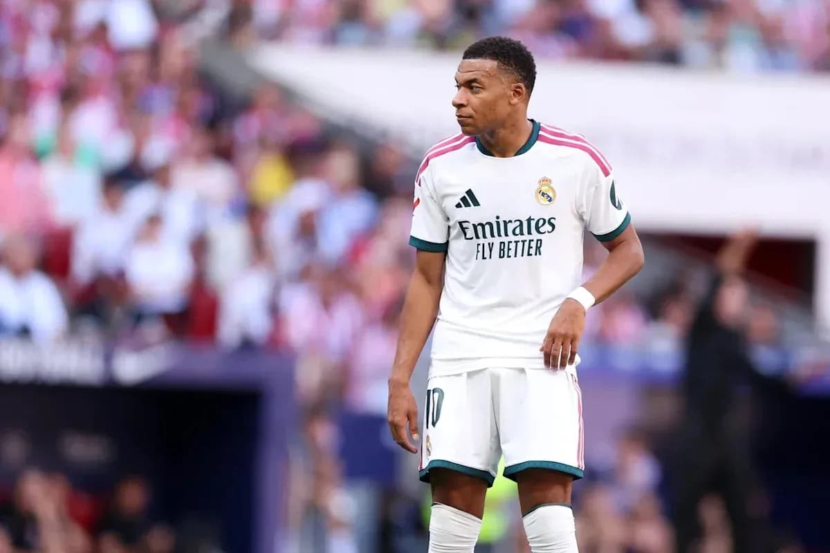 Kylian Mbappé in Real Madrid kit on field Kylian Mbappé in Real Madrid kit on field