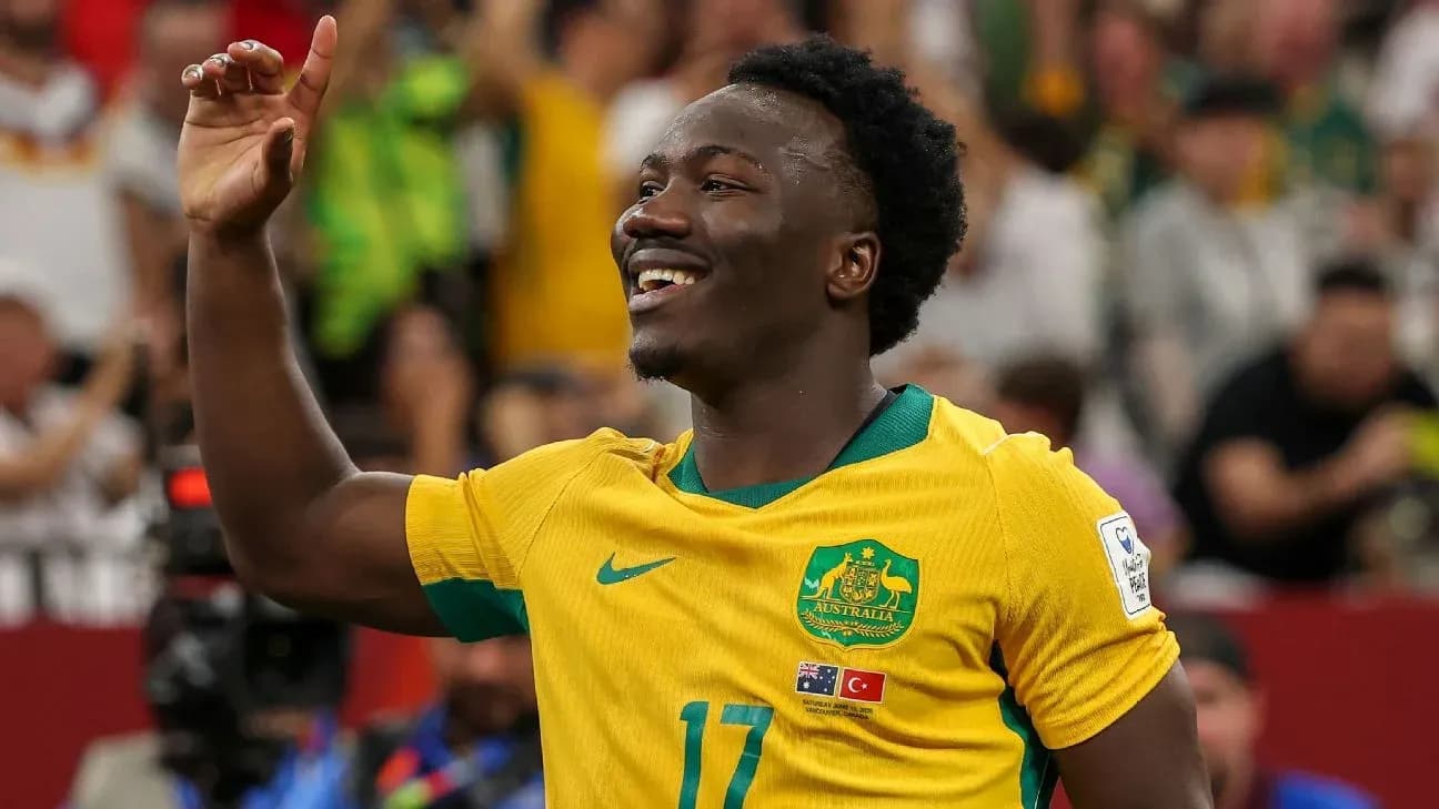 Player celebrating in Australia's yellow jersey during match Player celebrating in Australia's yellow jersey during match