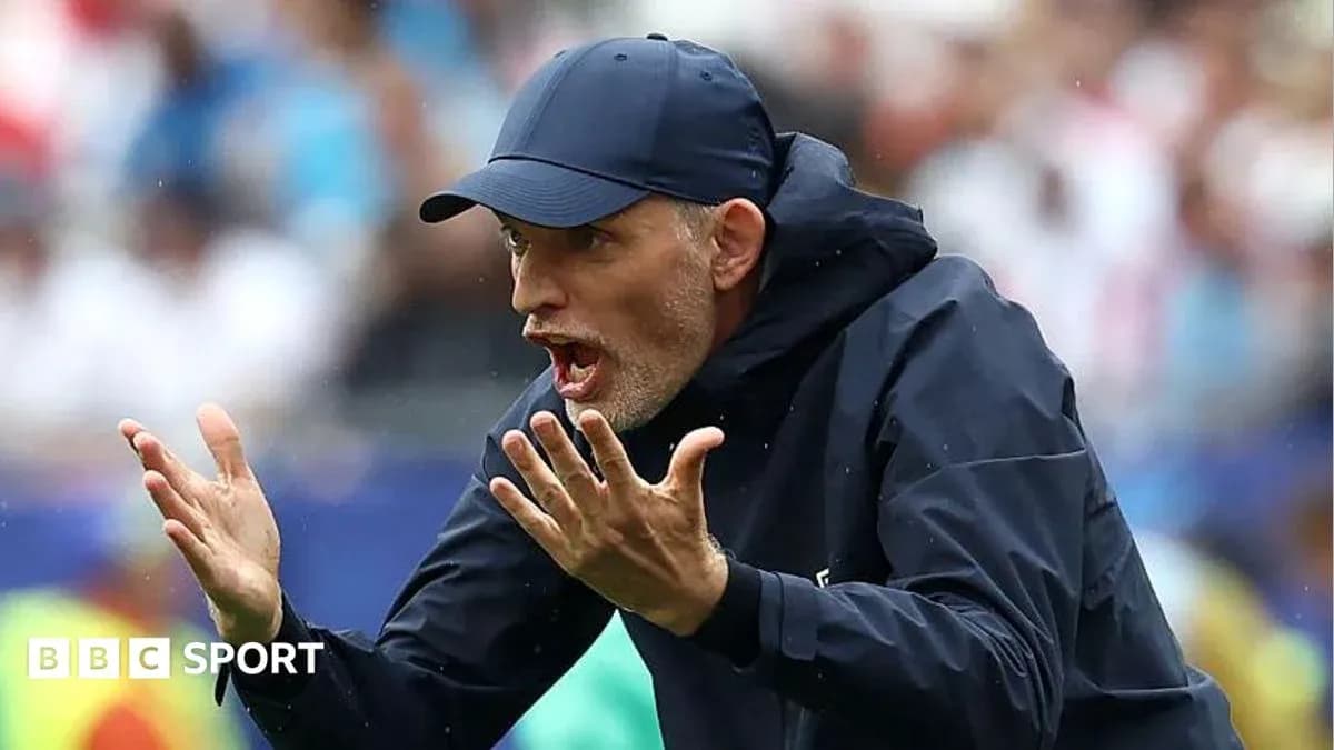 Coach gesturing during a match on the sidelines Coach gesturing during a match on the sidelines