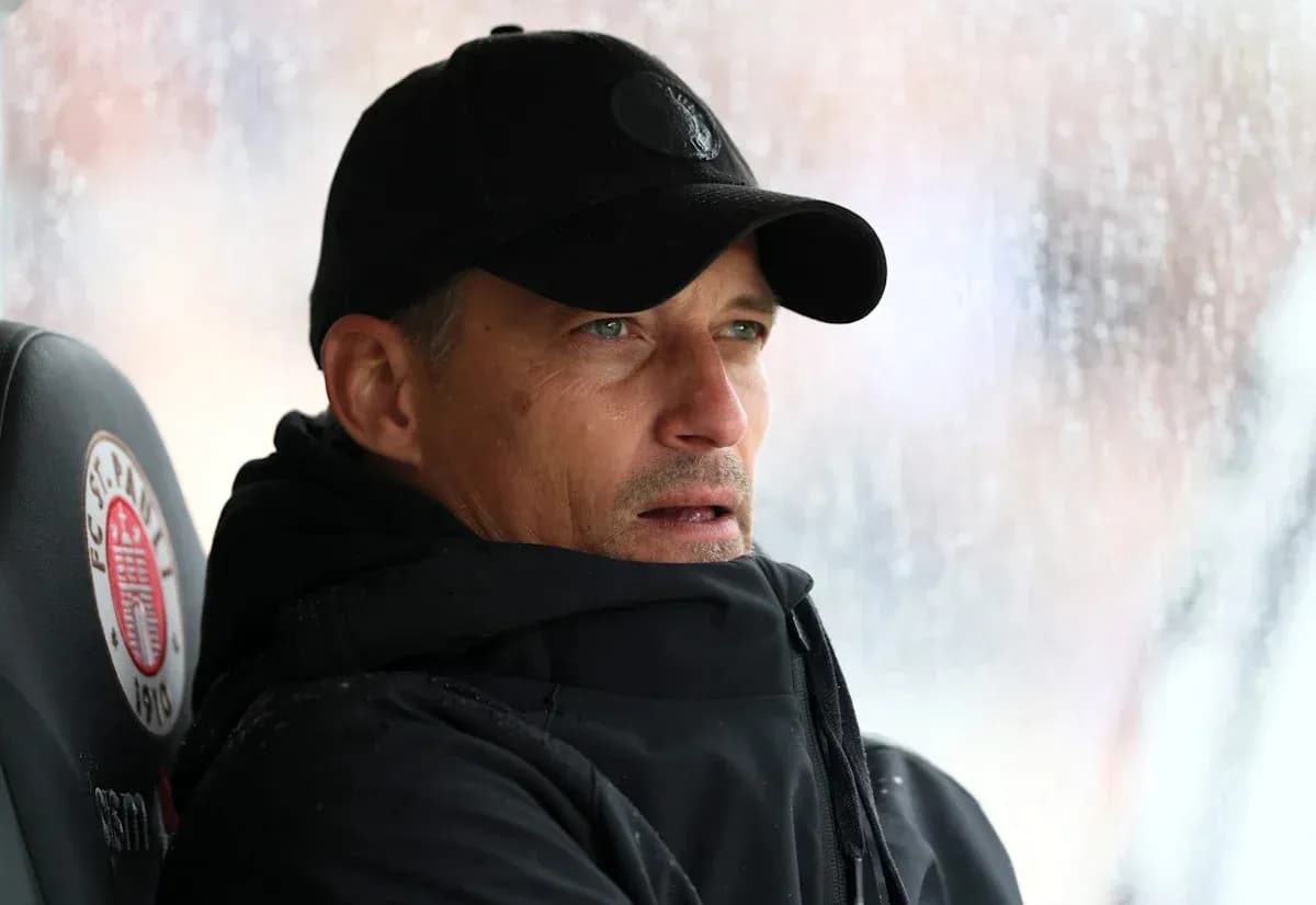 Coach observing from the bench during a match Coach observing from the bench during a match