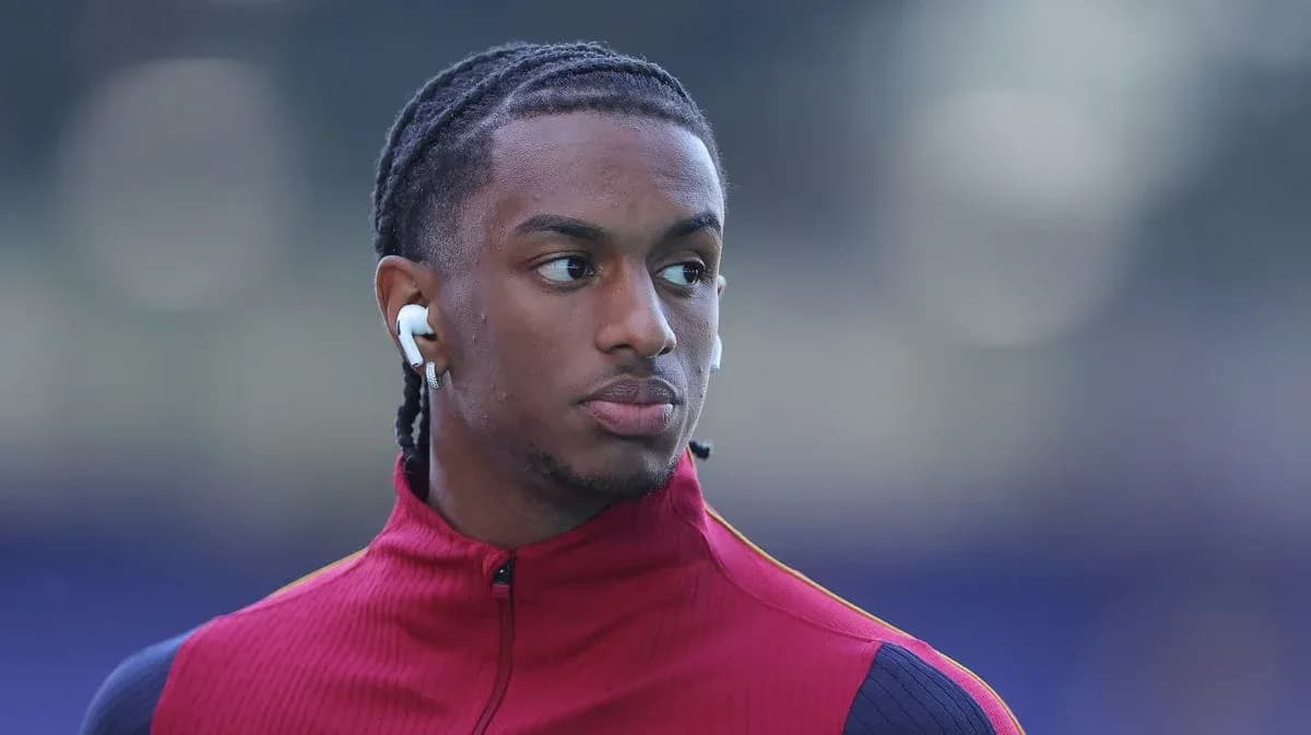 Player wearing earbuds before a match Player wearing earbuds before a match