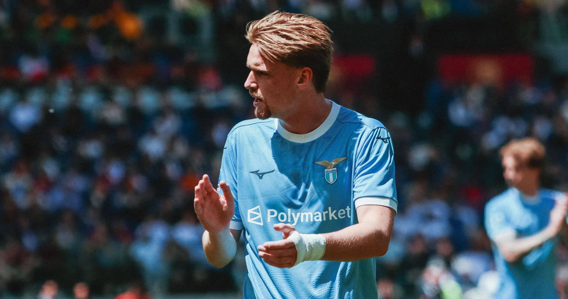 Lazio player applauding during a match Lazio player applauding during a match