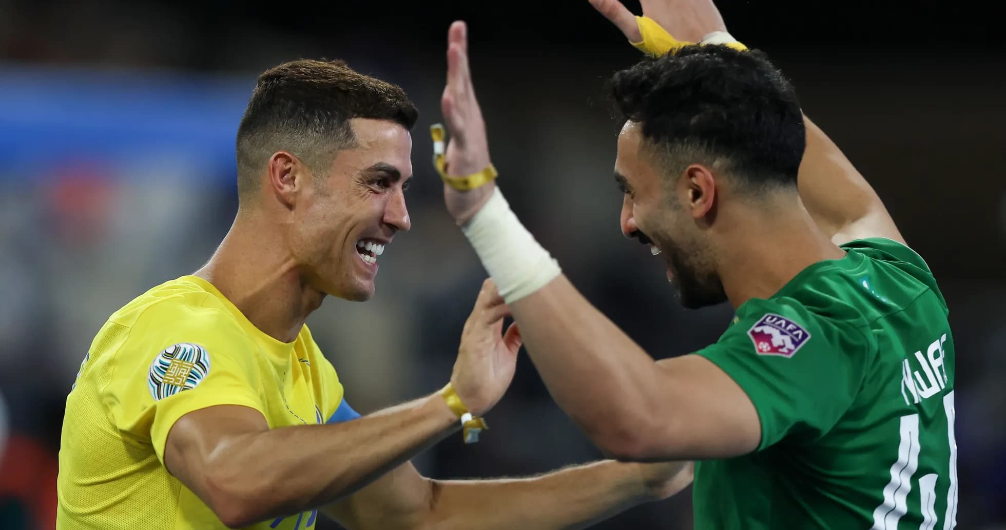 Two players celebrating after a match victory Two players celebrating after a match victory