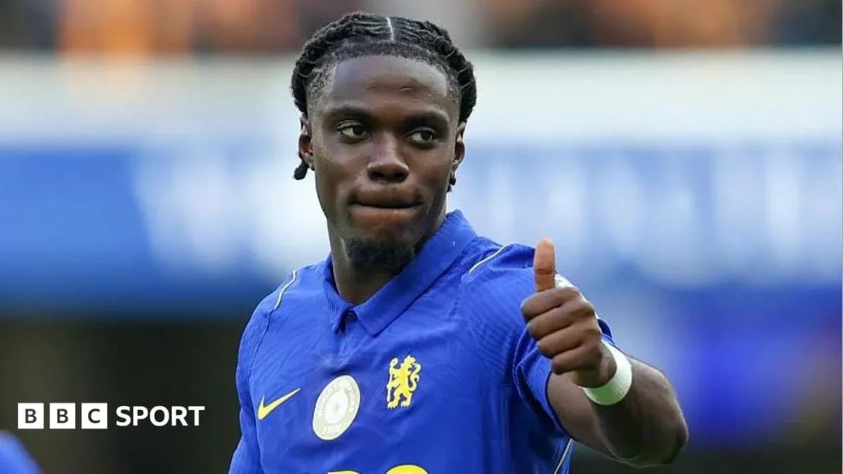 Player in blue jersey giving thumbs up gesture Player in blue jersey giving thumbs up gesture
