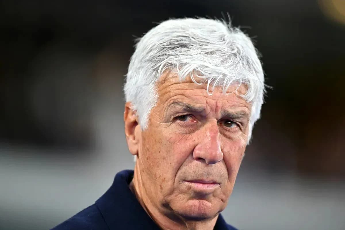 Coach with gray hair looking intently at camera Coach with gray hair looking intently at camera