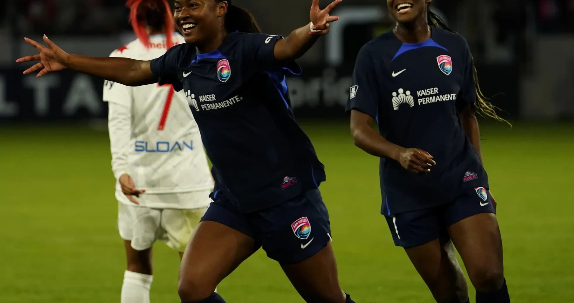 Players celebrating during NWSL match Players celebrating during NWSL match