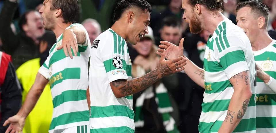 Celtic players celebrating a goal during match Celtic players celebrating a goal during match
