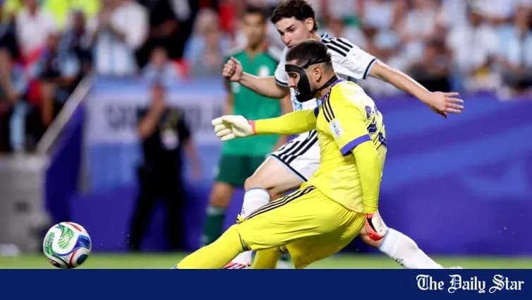 Goalkeeper in yellow diving to block shot Goalkeeper in yellow diving to block shot