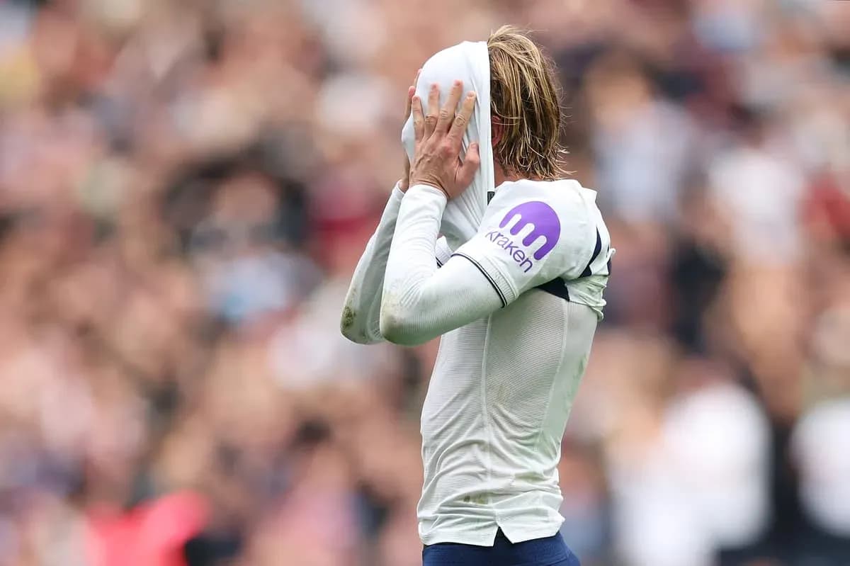 Player pulling shirt over head during match Player pulling shirt over head during match