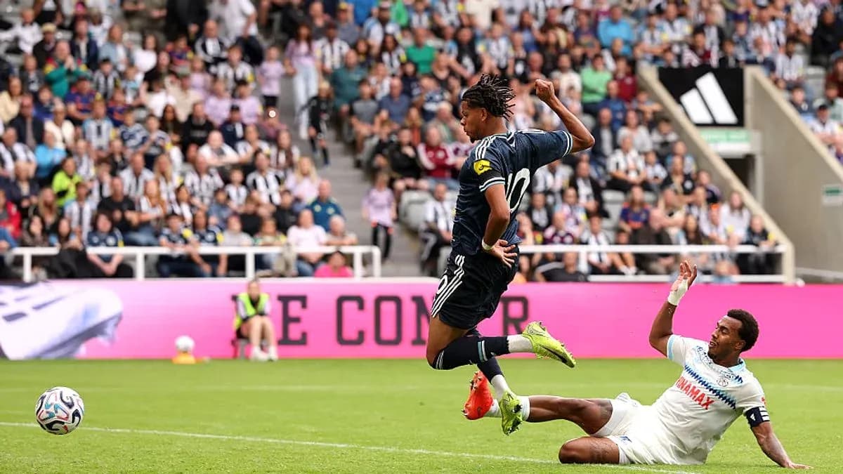 Player jumping over opponent during football match Player jumping over opponent during football match