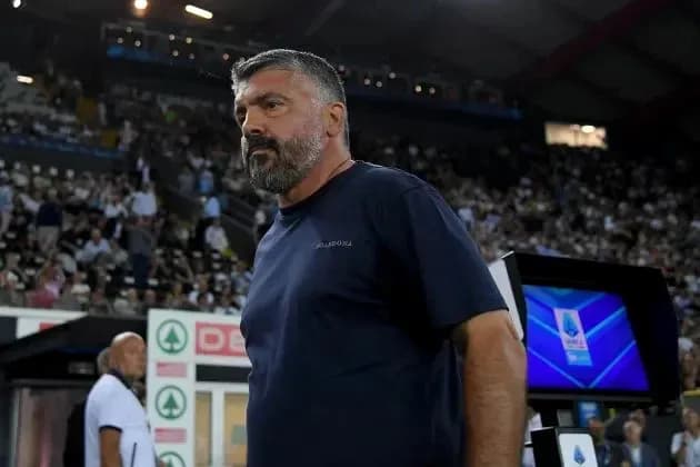 Coach on sidelines during a crowded match Coach on sidelines during a crowded match