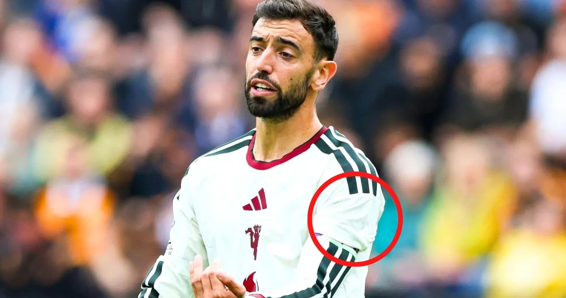 Player gesturing during match with team jersey Player gesturing during match with team jersey