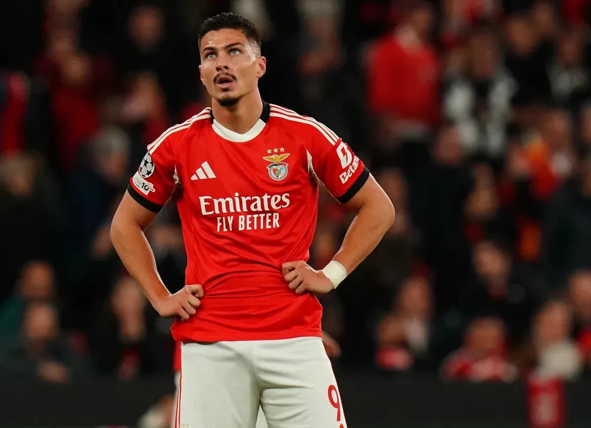 Benfica player looking concerned on the pitch Benfica player looking concerned on the pitch