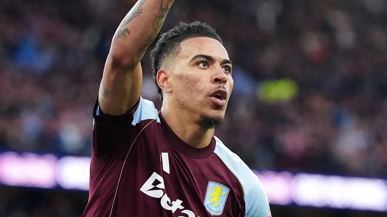 Player celebrating during a match at Villa Park Player celebrating during a match at Villa Park