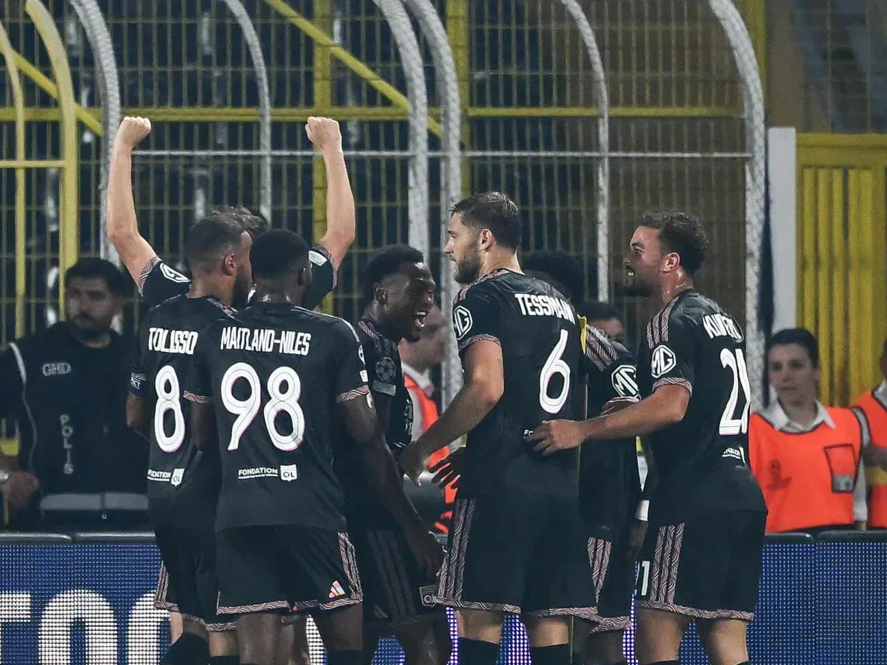 Players celebrating a goal during UEFA match Players celebrating a goal during UEFA match