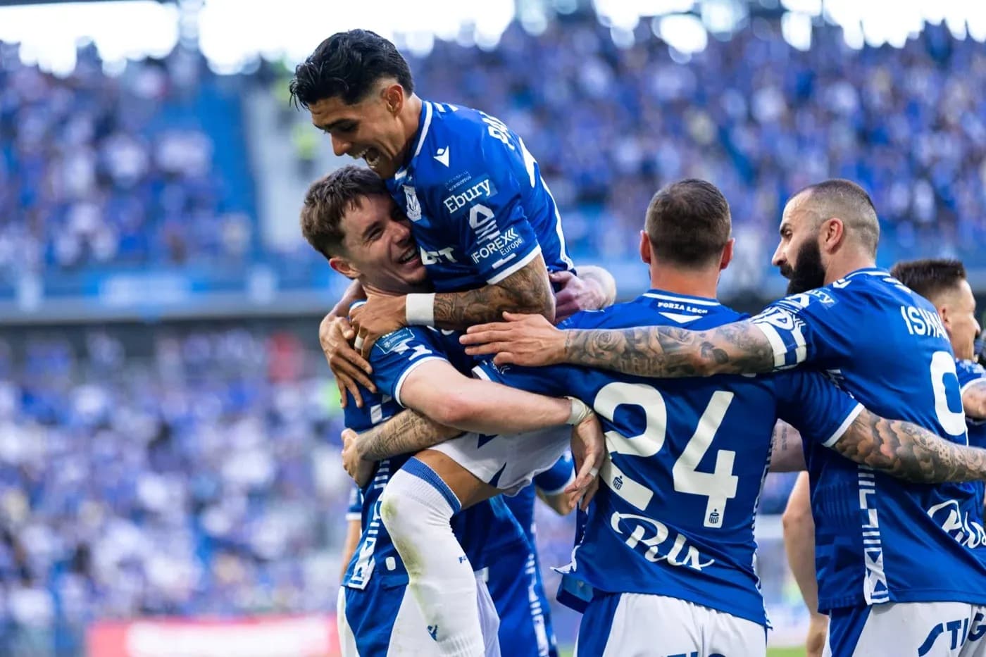Lech Poznan players celebrating a goal Lech Poznan players celebrating a goal