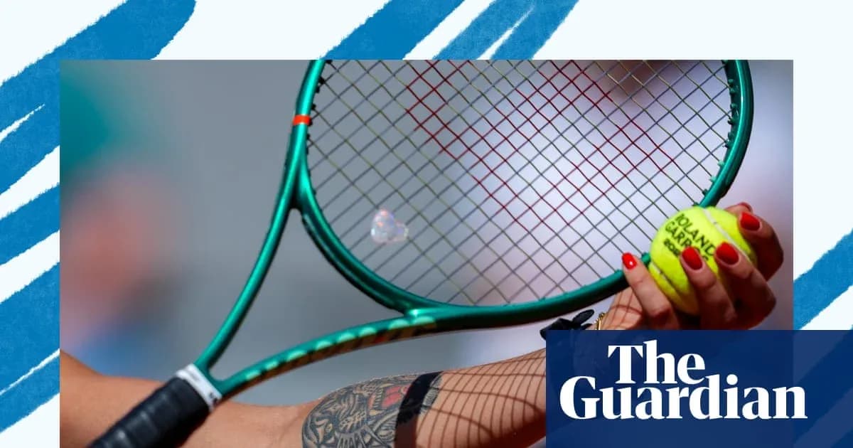 Close-up of tennis racket and ball in hand Close-up of tennis racket and ball in hand
