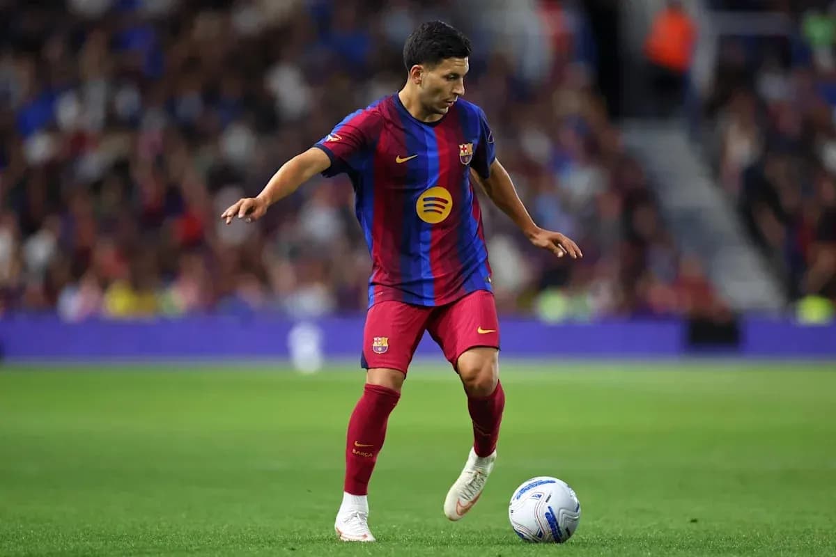 Player dribbling the ball during match for Barcelona Player dribbling the ball during match for Barcelona