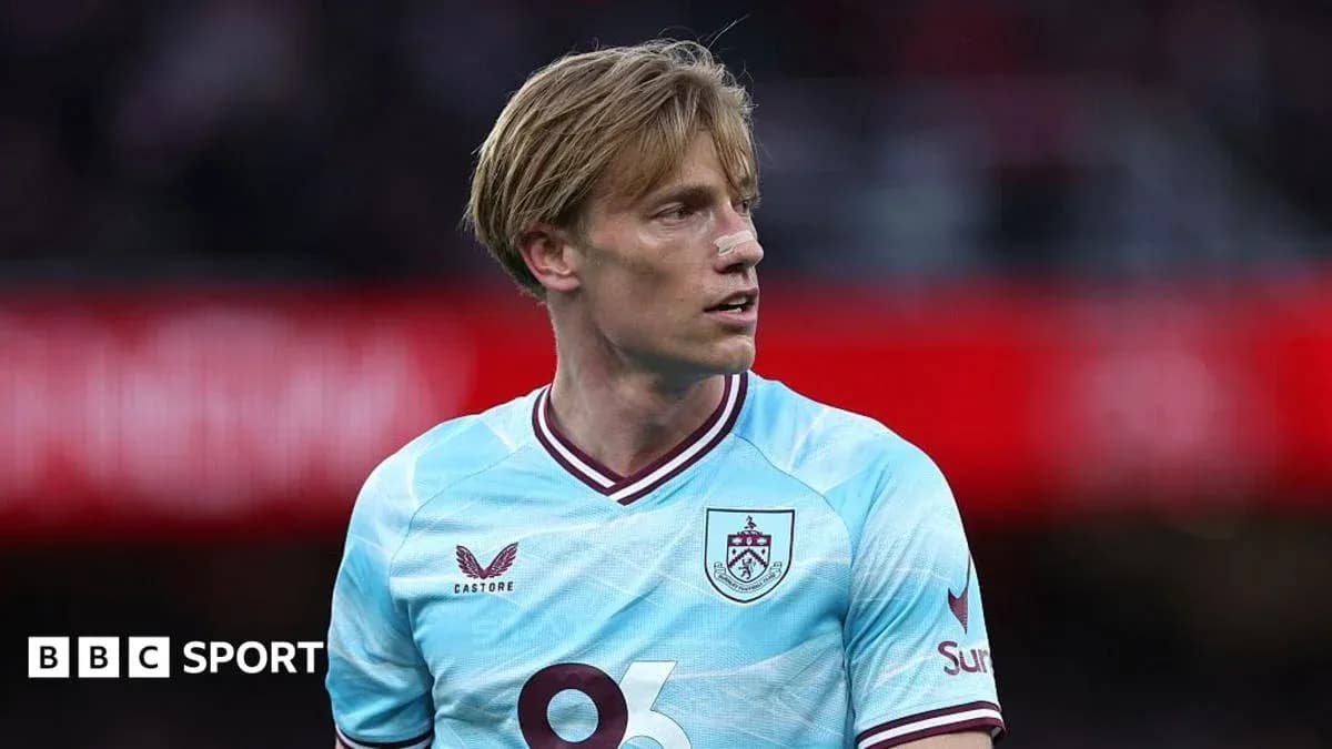 Burnley player during match with injury on face Burnley player during match with injury on face