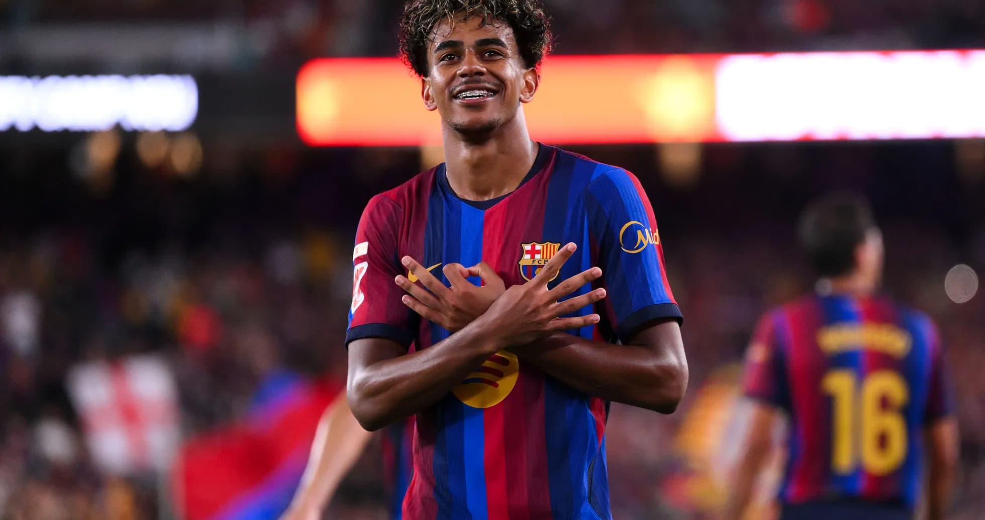 Player celebrating a goal at FC Barcelona match Player celebrating a goal at FC Barcelona match