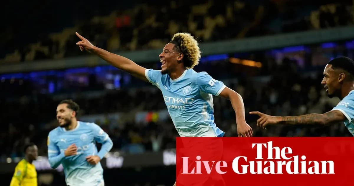 Player celebrating a goal with teammates at stadium Player celebrating a goal with teammates at stadium