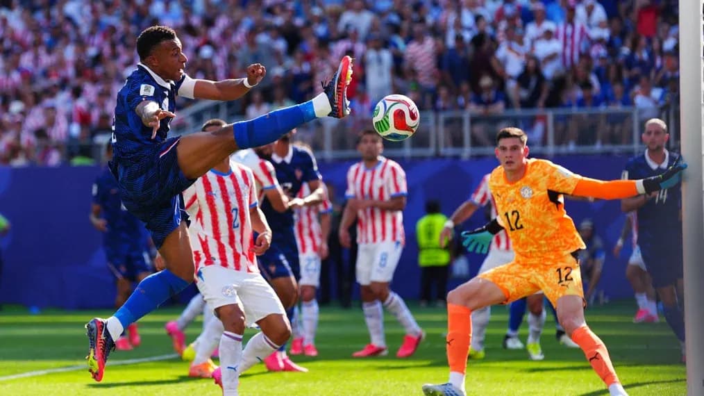 Player attempting a kick during a soccer match Player attempting a kick during a soccer match