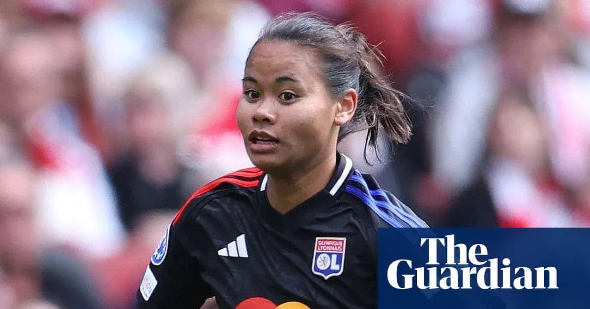 Player in action wearing Lyon jersey during match Player in action wearing Lyon jersey during match