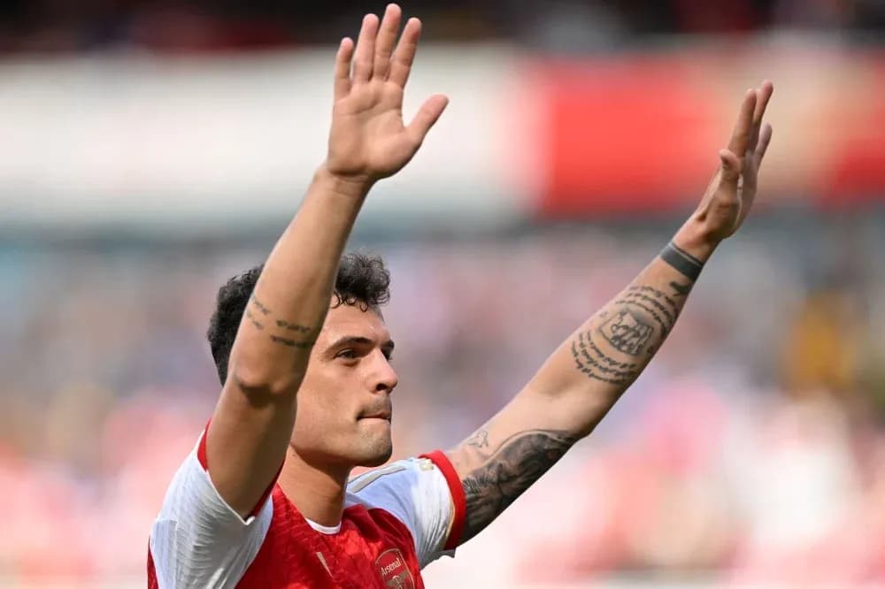 Player waving to fans after match at stadium Player waving to fans after match at stadium