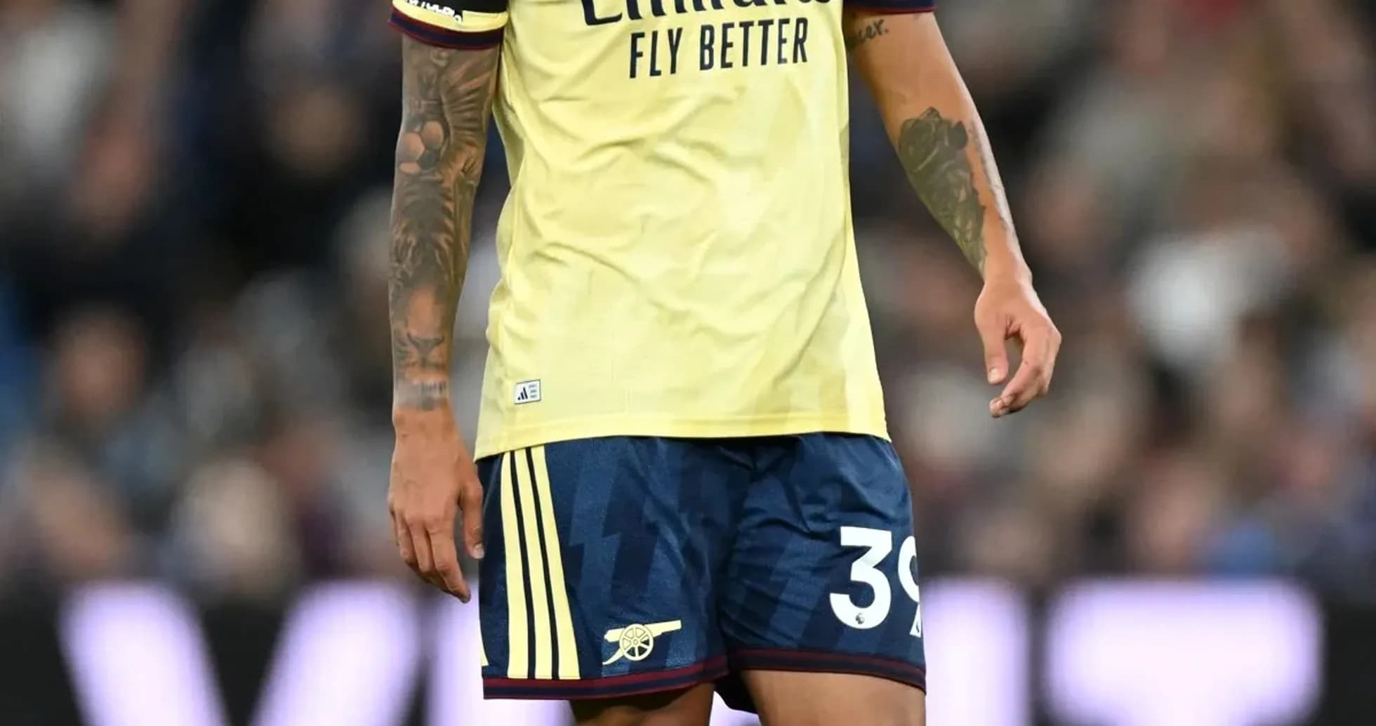 Player in Arsenal kit during a match Player in Arsenal kit during a match