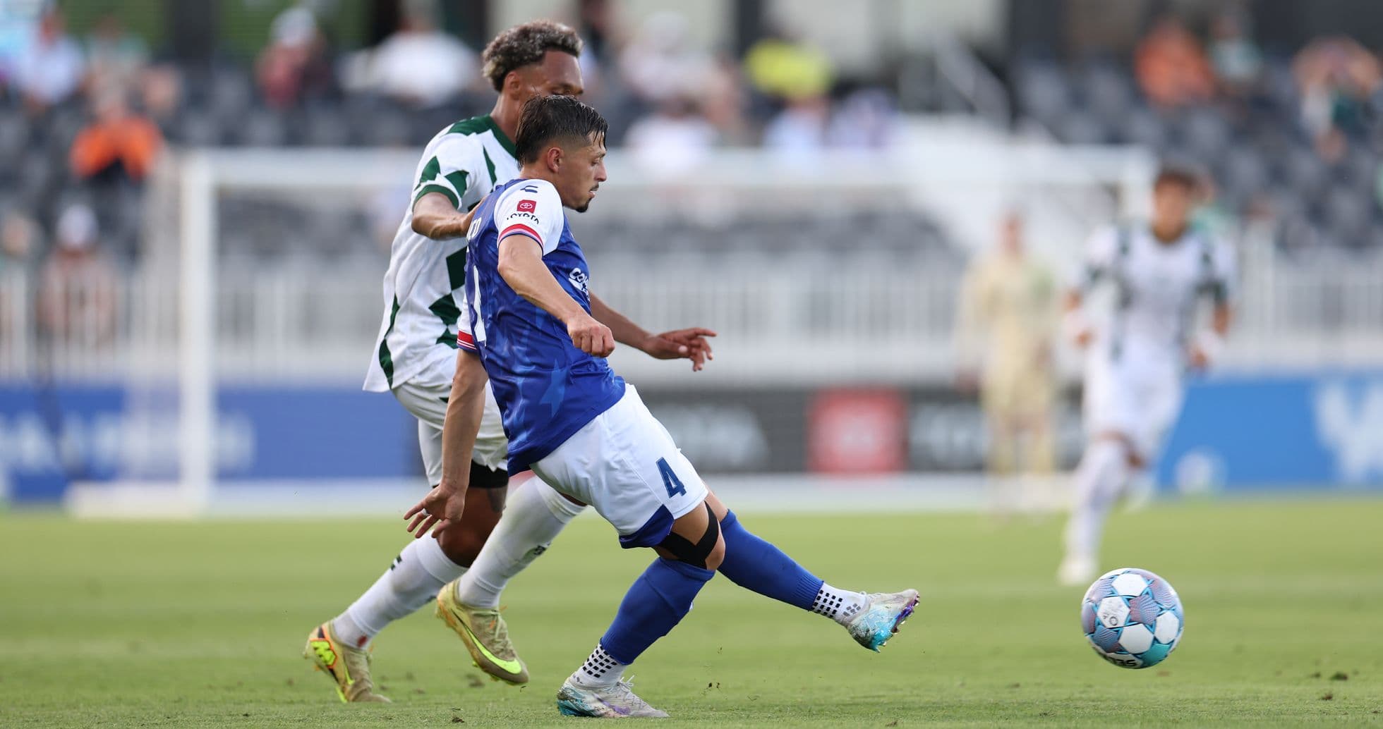 Player kicking ball during Lexington vs San Antonio match Player kicking ball during Lexington vs San Antonio match