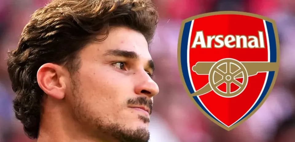 Player with Arsenal logo in background Player with Arsenal logo in background