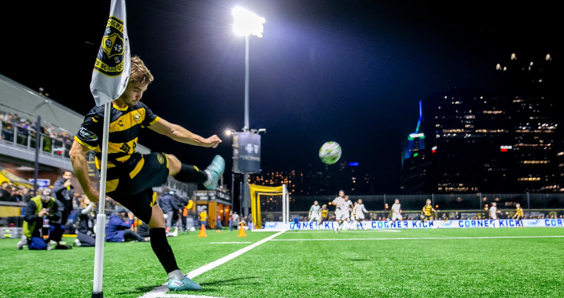 Player taking a corner kick during match Player taking a corner kick during match