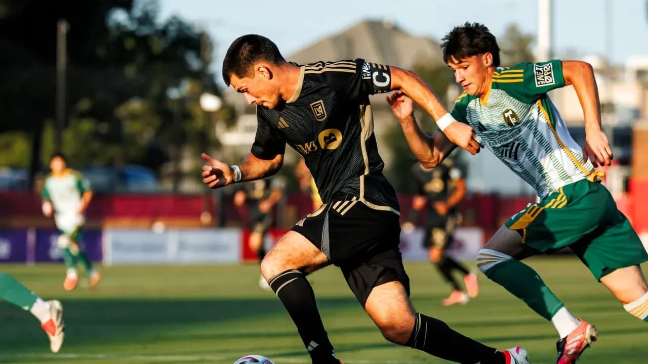 Los Angeles FC II player dribbling past defender Los Angeles FC II player dribbling past defender