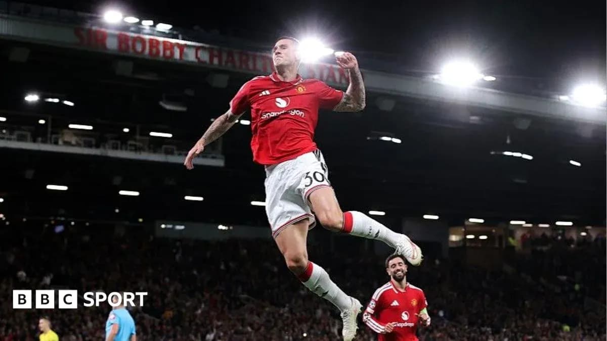 Player celebrating goal during match at Old Trafford Player celebrating goal during match at Old Trafford