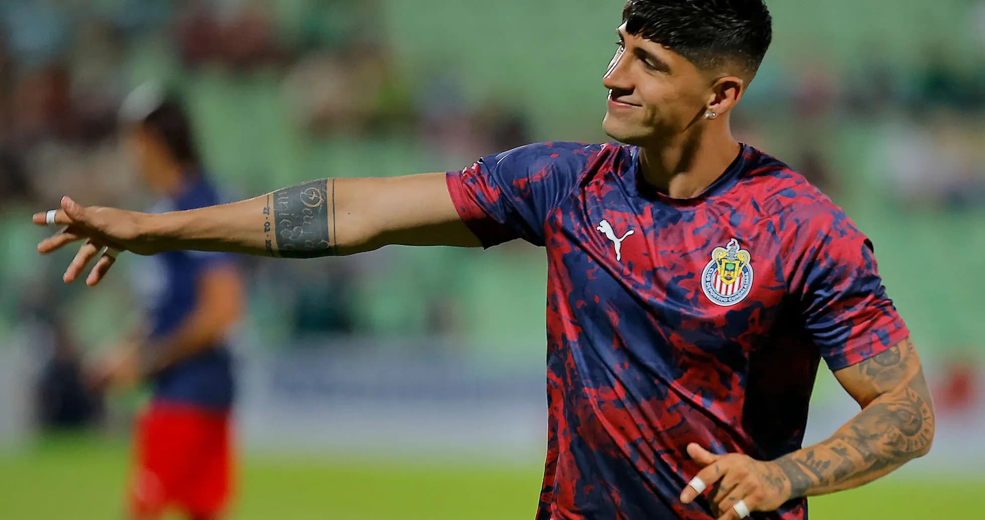 Guadalajara Chivas player warming up before match Guadalajara Chivas player warming up before match