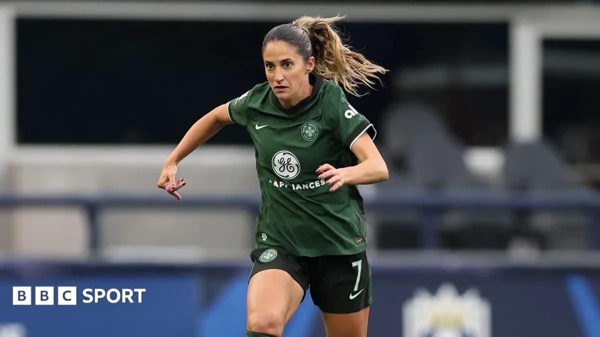 Player in green kit running on the pitch Player in green kit running on the pitch
