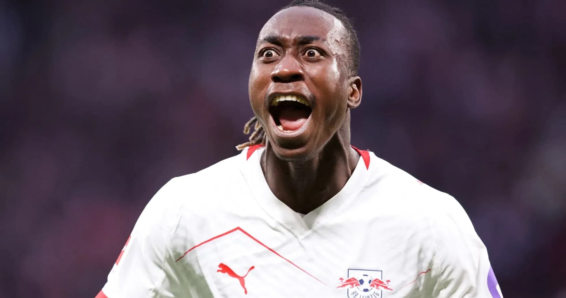 Player celebrating a goal during a match Player celebrating a goal during a match