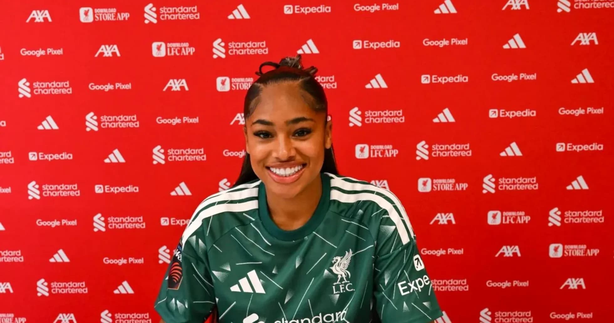 Player in Liverpool jersey at press conference Player in Liverpool jersey at press conference