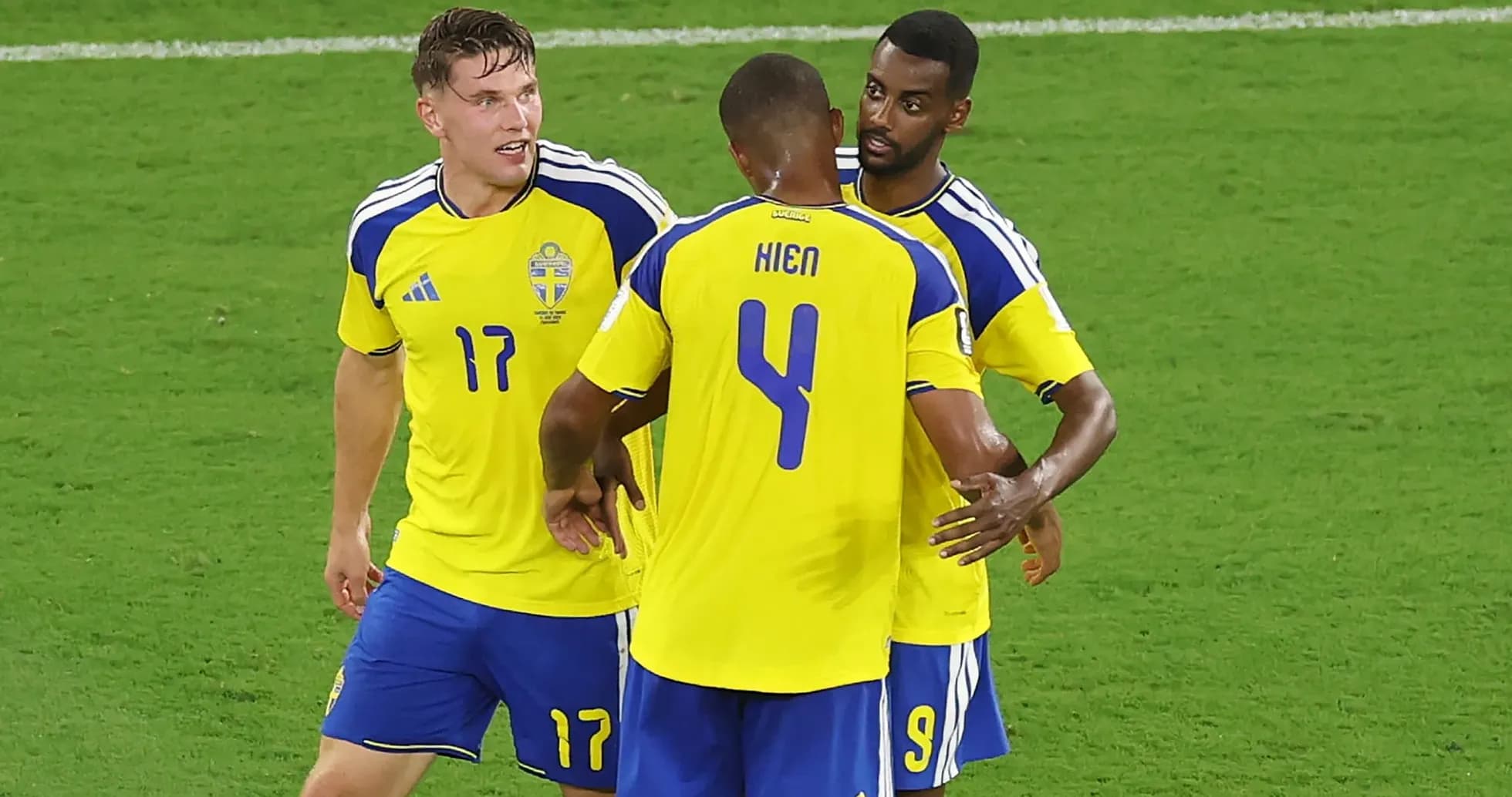 Sweden players celebrating a goal on the field Sweden players celebrating a goal on the field