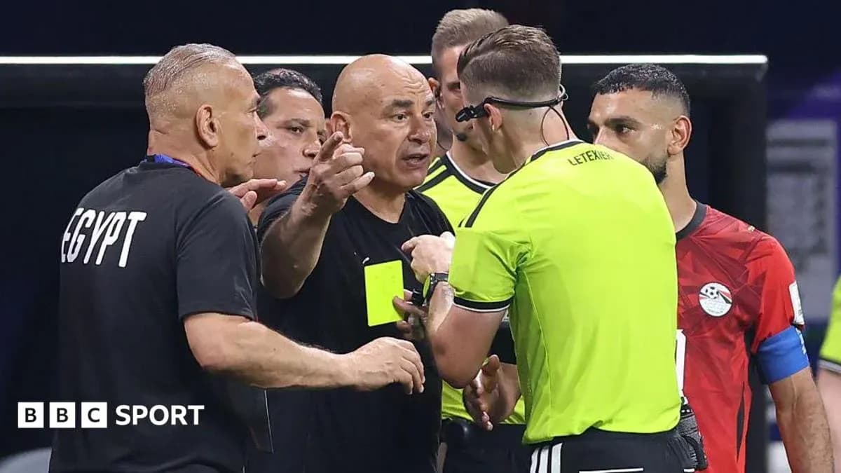 Coach arguing with referee during match discussion Coach arguing with referee during match discussion