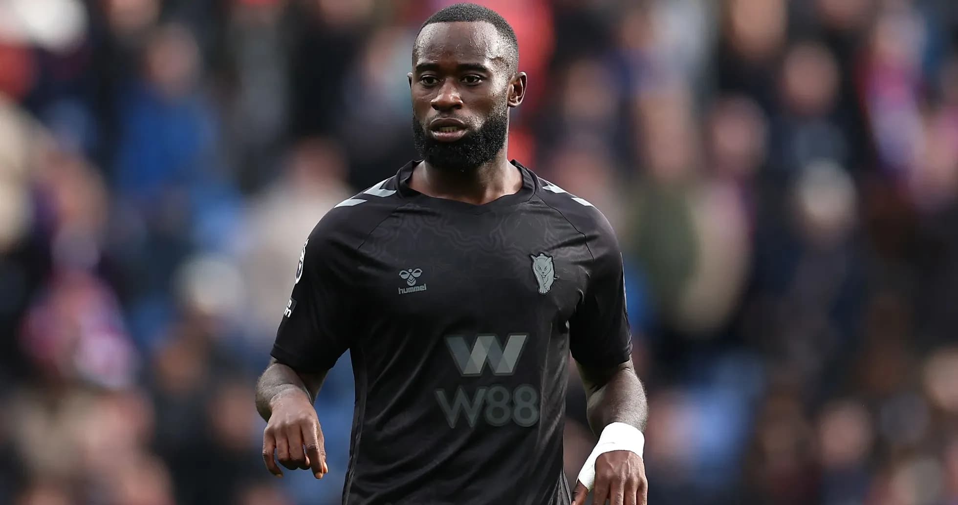 Player wearing black jersey during match action Player wearing black jersey during match action