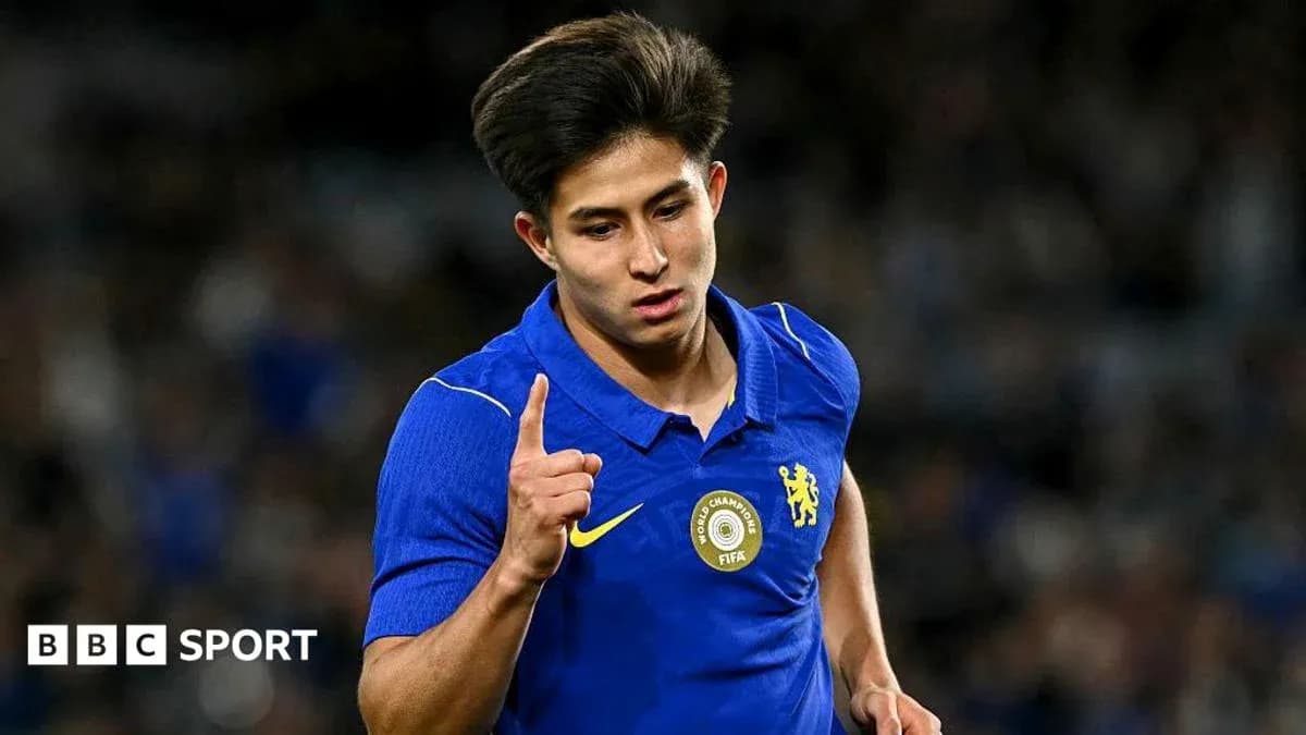 Player celebrating a goal in blue jersey Player celebrating a goal in blue jersey