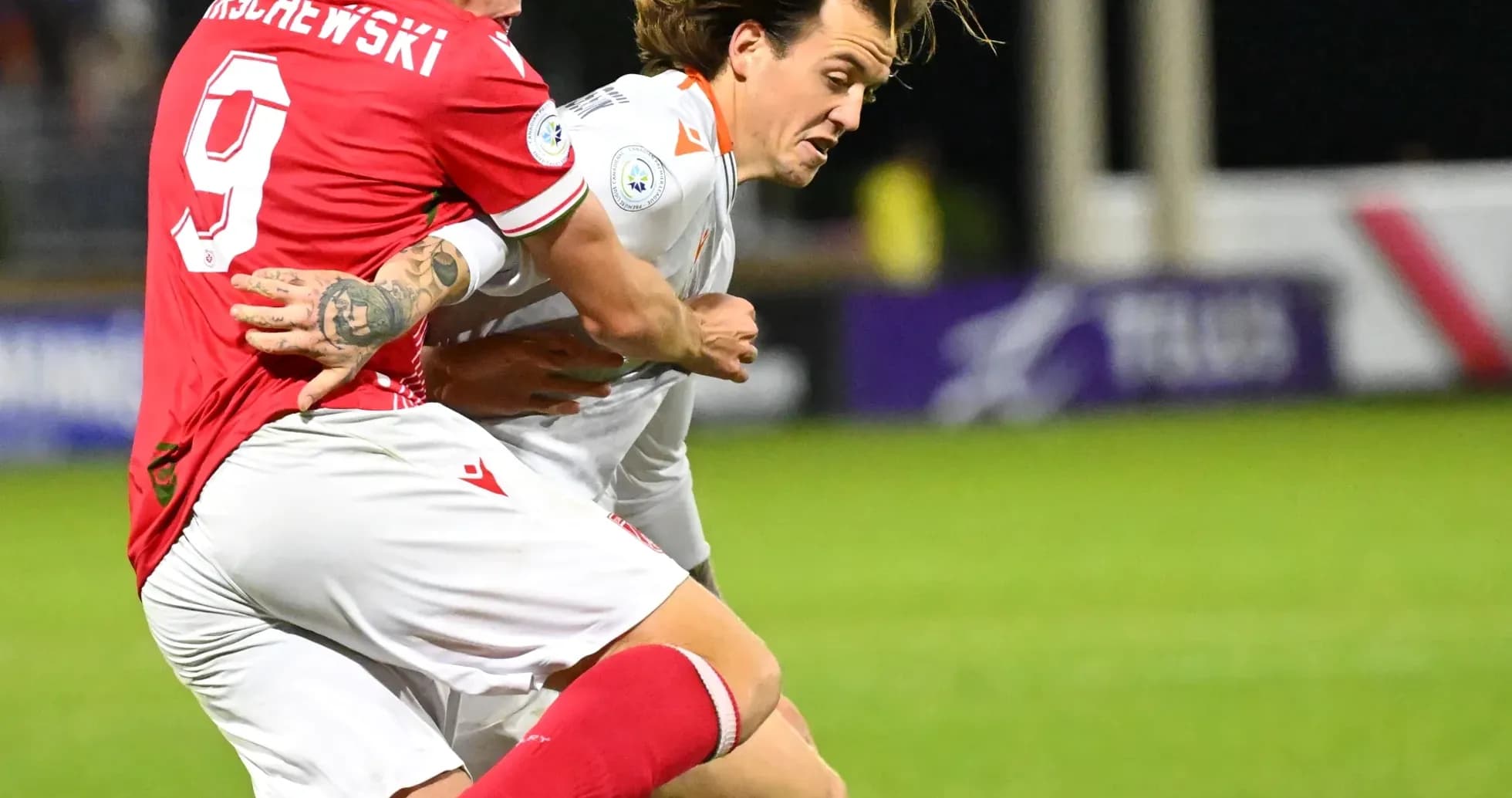 Player tackling during Forge vs Cavalry FC match Player tackling during Forge vs Cavalry FC match