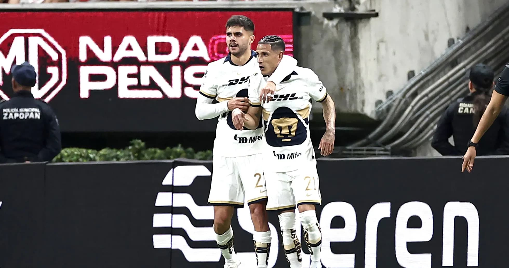 Pumas players celebrating a goal during match Pumas players celebrating a goal during match