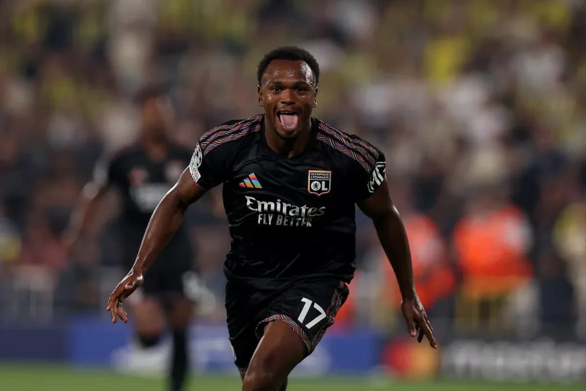 Lyon player celebrating a goal in Champions League Lyon player celebrating a goal in Champions League