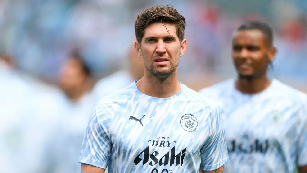 Player in Manchester City training kit during warm-up Player in Manchester City training kit during warm-up