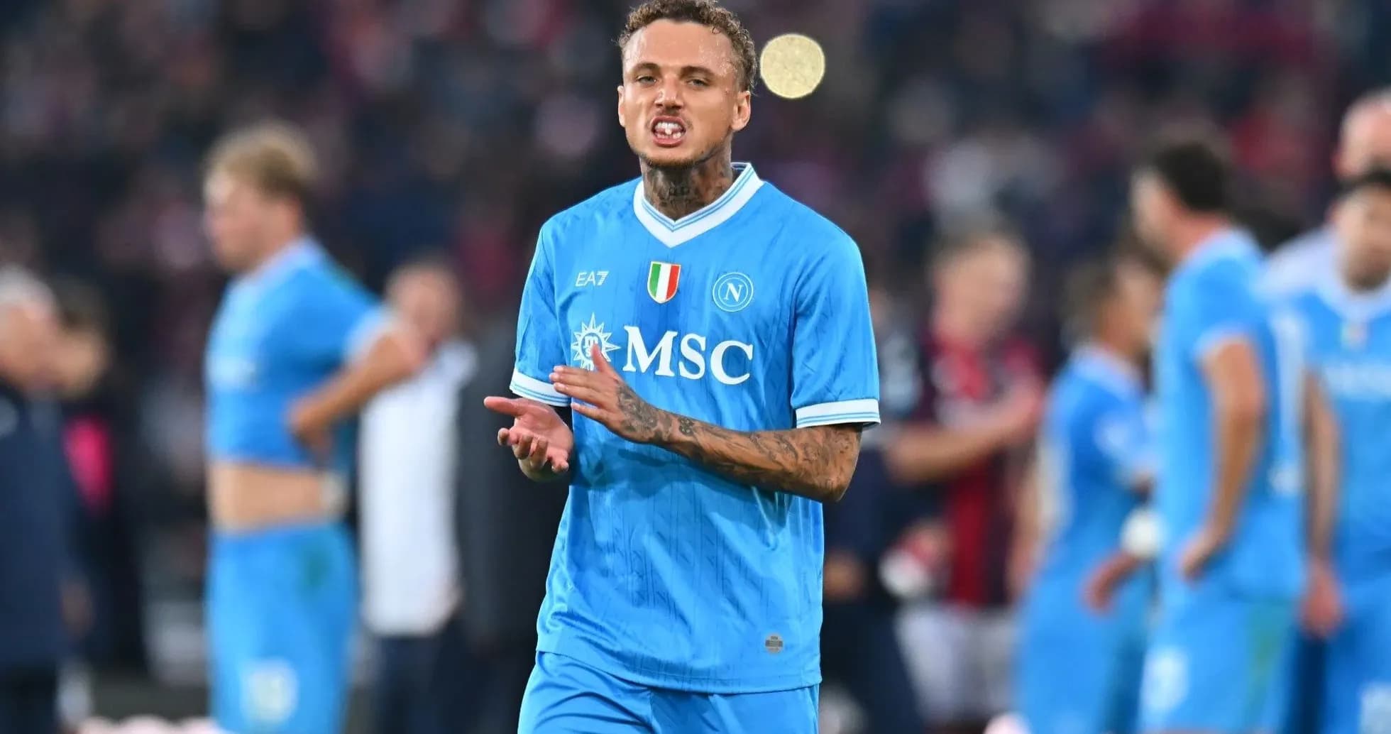 Player in blue Napoli kit on the field Player in blue Napoli kit on the field